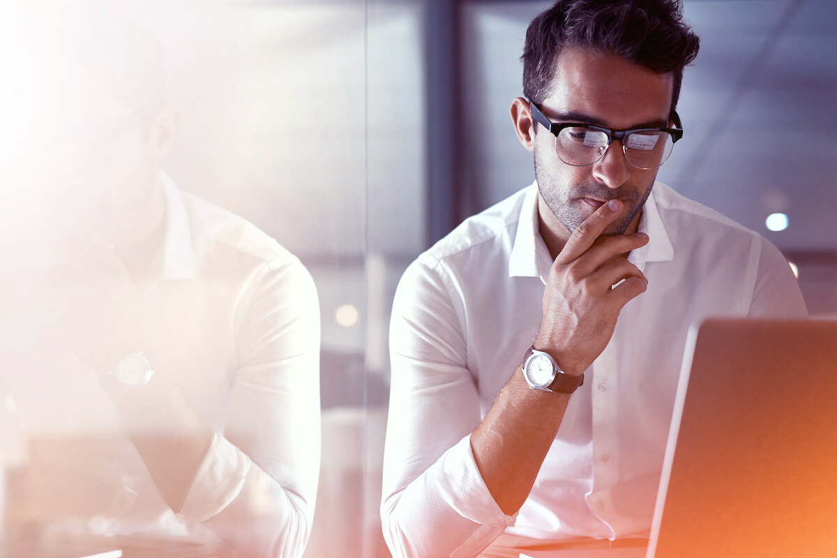 man looking at computer